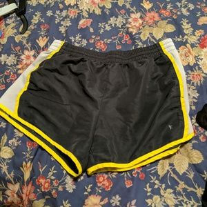Gray and yellow athletic shorts